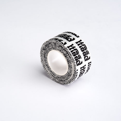 Roll of tape with text on a white background