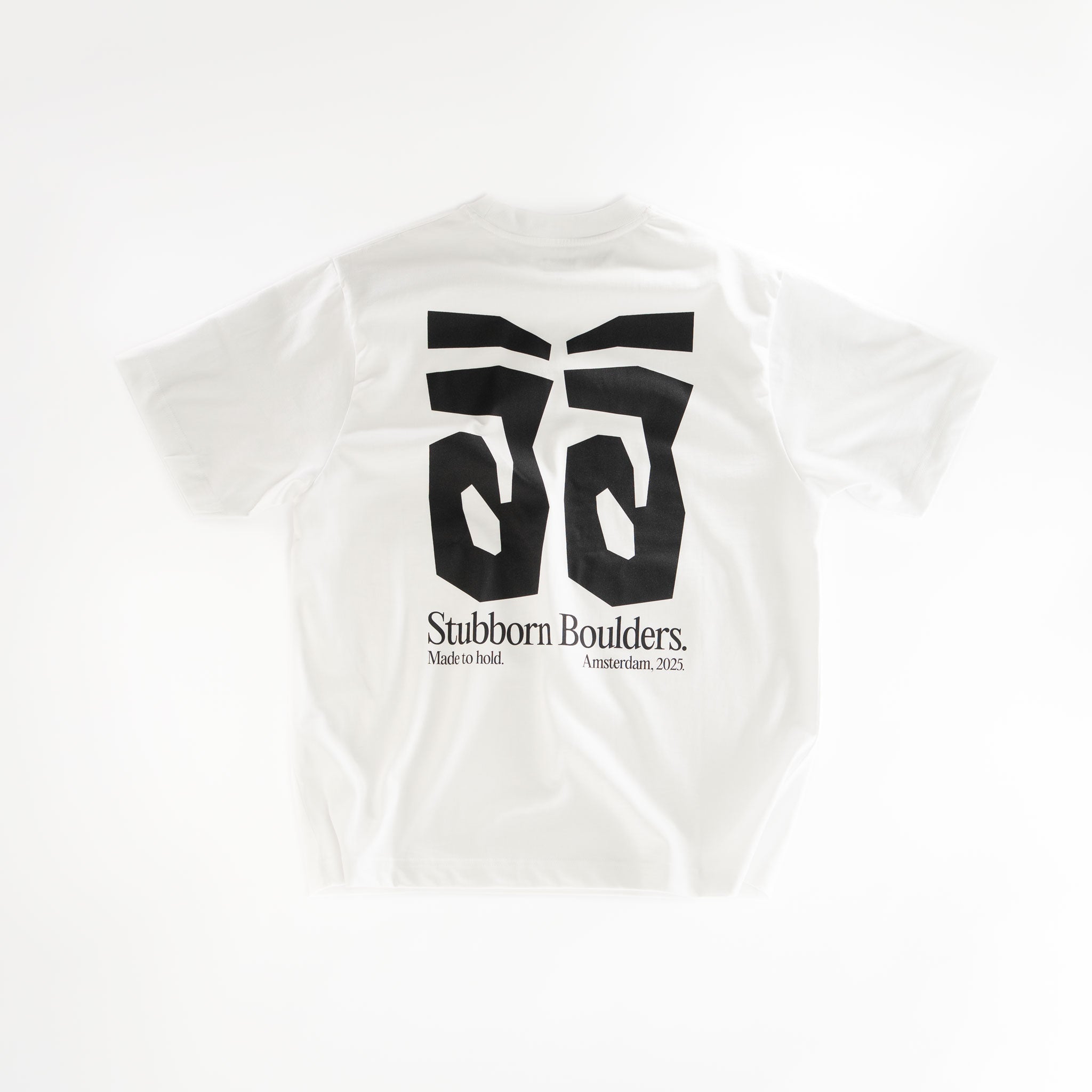 White t-shirt with black graphic design and text on a white background